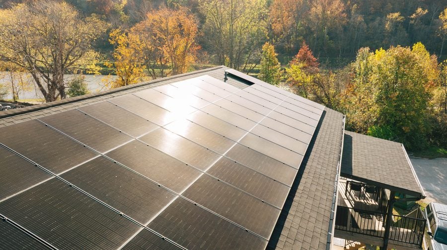 Solar Holler installation — autumn hillside home