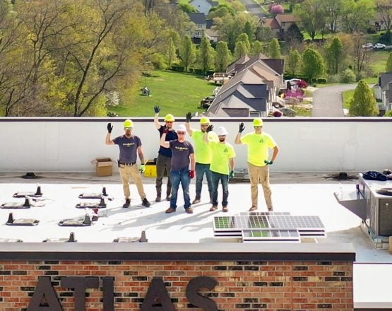 Atlast-Solar-panel-installation-crew-waving-commercial-business-west-virginia