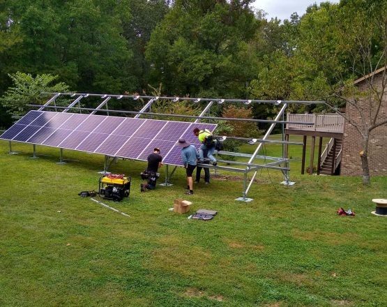 Solar Holler Panel Installation Crew Ground Mount in West Virginia